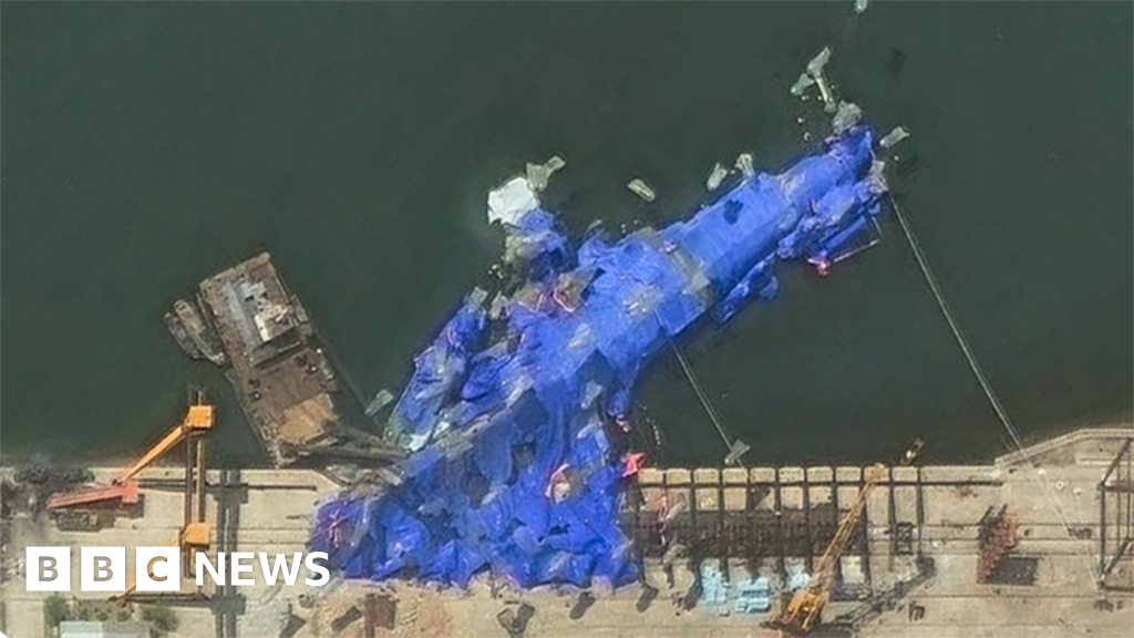 North Korea detains three officials over warship launch accident